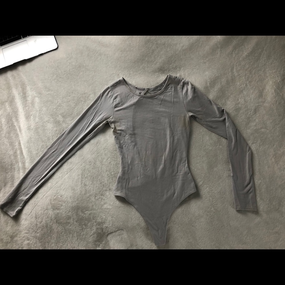 TNA light grey long sleeve, open back body suit
